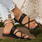 Black Rome style ring toe flat sandals with braided straps from The Lady's Haven Boutique
