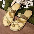 Gold Rome style ring toe flat sandals with braided straps from The Lady's Haven Boutique