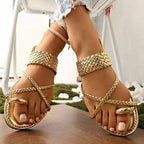 Gold Rome style ring toe flat sandals with braided straps and ankle support from The Lady's Haven Boutique