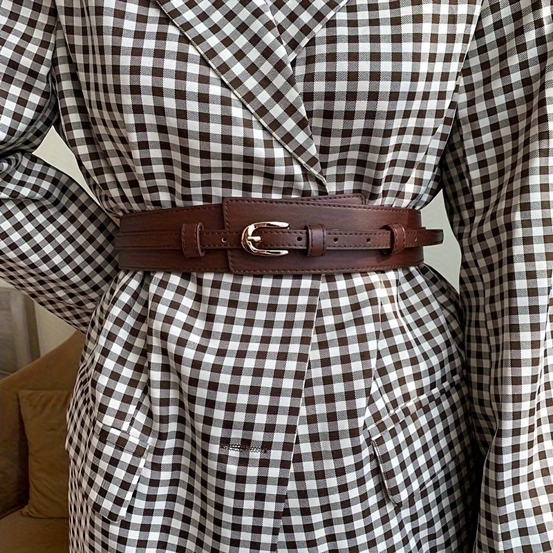Stylish vintage wide belt for women made of brown leather, perfect for enhancing outfits