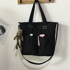 Stylish waterproof ladies handbag in black with pockets for convenience and charm accessory