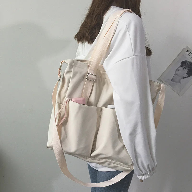 Stylish waterproof ladies handbag with multiple pockets and adjustable straps for everyday use