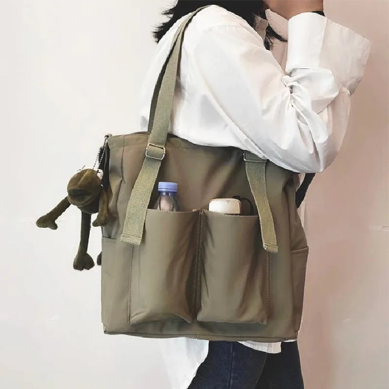 Stylish waterproof ladies handbag in olive with multiple pockets for convenience and storage