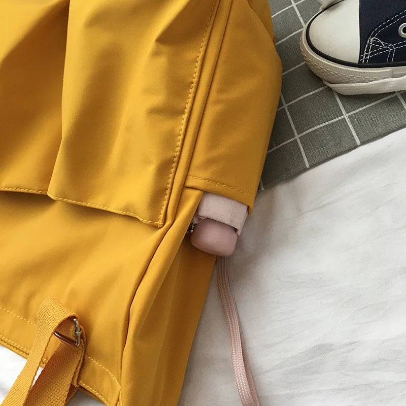 Stylish yellow waterproof ladies handbag with durable material and sleek design