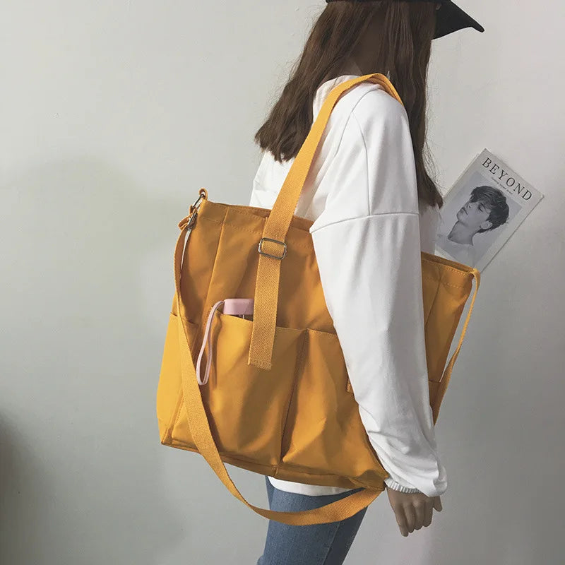 Stylish waterproof ladies handbag in bright yellow, perfect for everyday use and casual outings