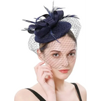 Elegant navy wedding pillbox hat with feathers and netting for a sophisticated look