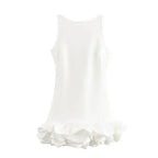 White summer party mini dress with sleeveless design and ruffled hem from The Lady's Haven Boutique