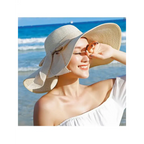 Wide brim floppy hat for women, cream color with a stylish bow, perfect for beach days