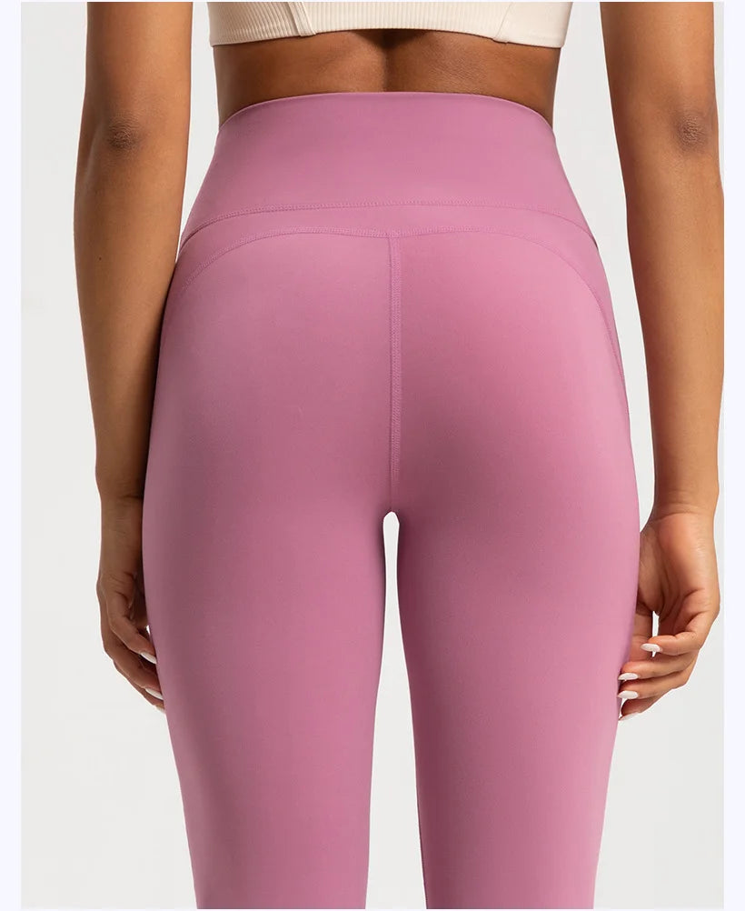 Back view of wide leg sports leggings in pastel pink from The Lady's Haven Boutique