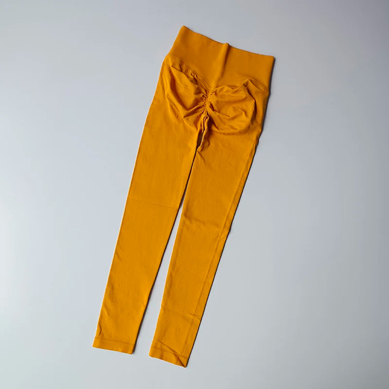 Yellow women hip lift leggings from The Lady's Haven Boutique for stylish workouts