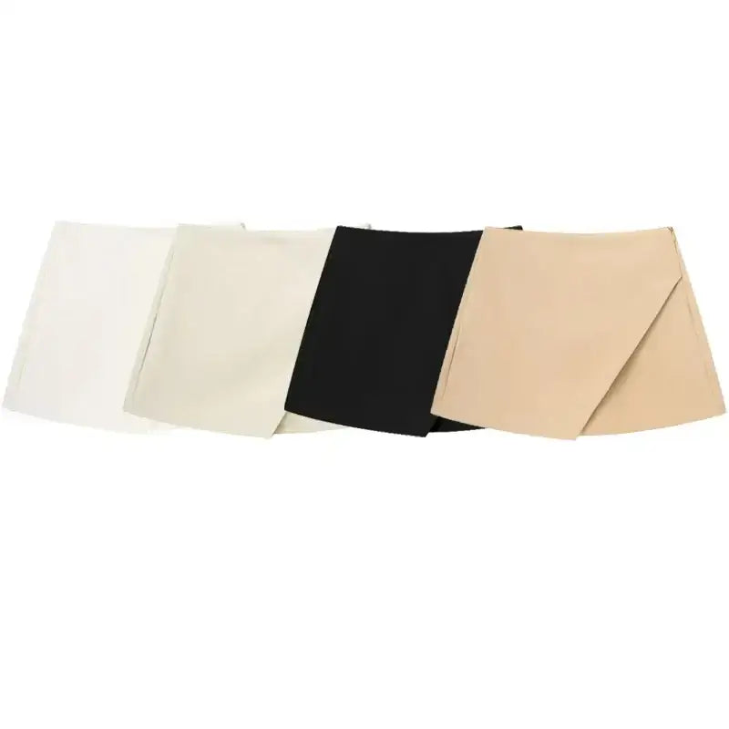 Set of four fashionable skorts in white, beige, black, and tan from The Lady's Haven Boutique