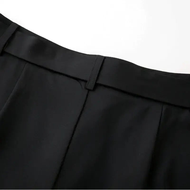 Close-up of black high waisted shorts waistband and belt loops from The Lady's Haven Boutique