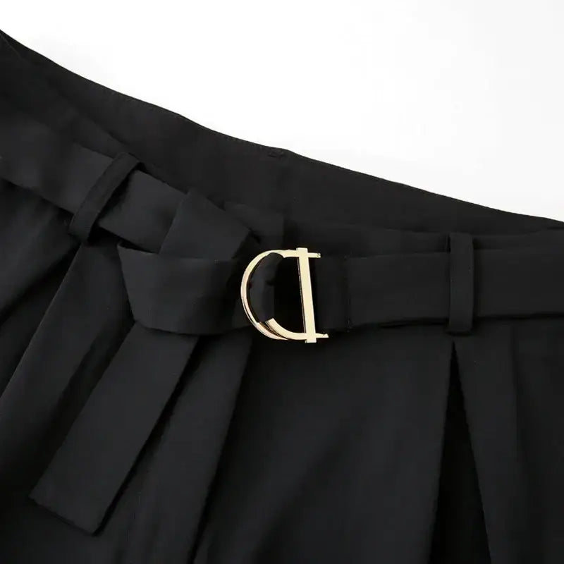 Black high waisted shorts with a stylish fabric belt and gold buckle from The Lady's Haven Boutique