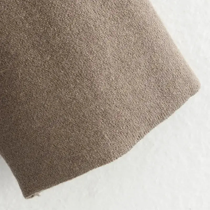 Close-up of beige fabric sleeve detail for long sleeve cardigan for ladies from The Lady's Haven Boutique