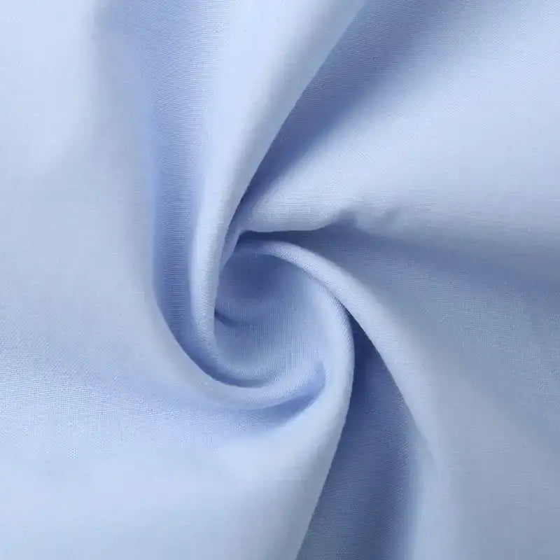 Light blue fabric close-up for spring long sleeve office shirt from The Lady's Haven Boutique
