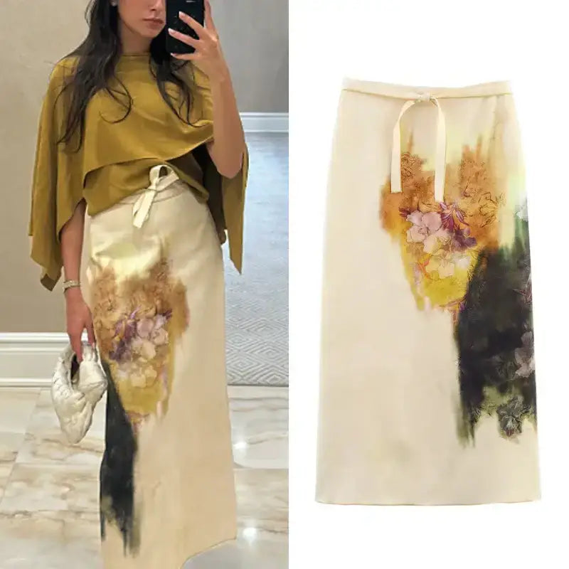 Fashion casual skirts with print featuring watercolor floral design and tied waist belt in cream color