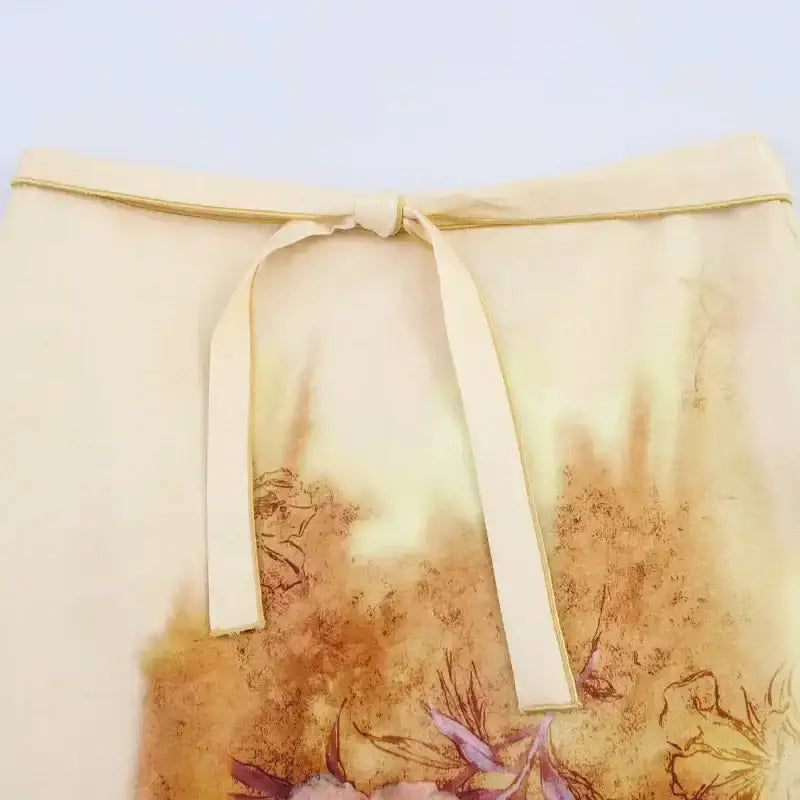 The Lady's Haven Boutique fashion casual skirts with print featuring a soft tie waist and floral design