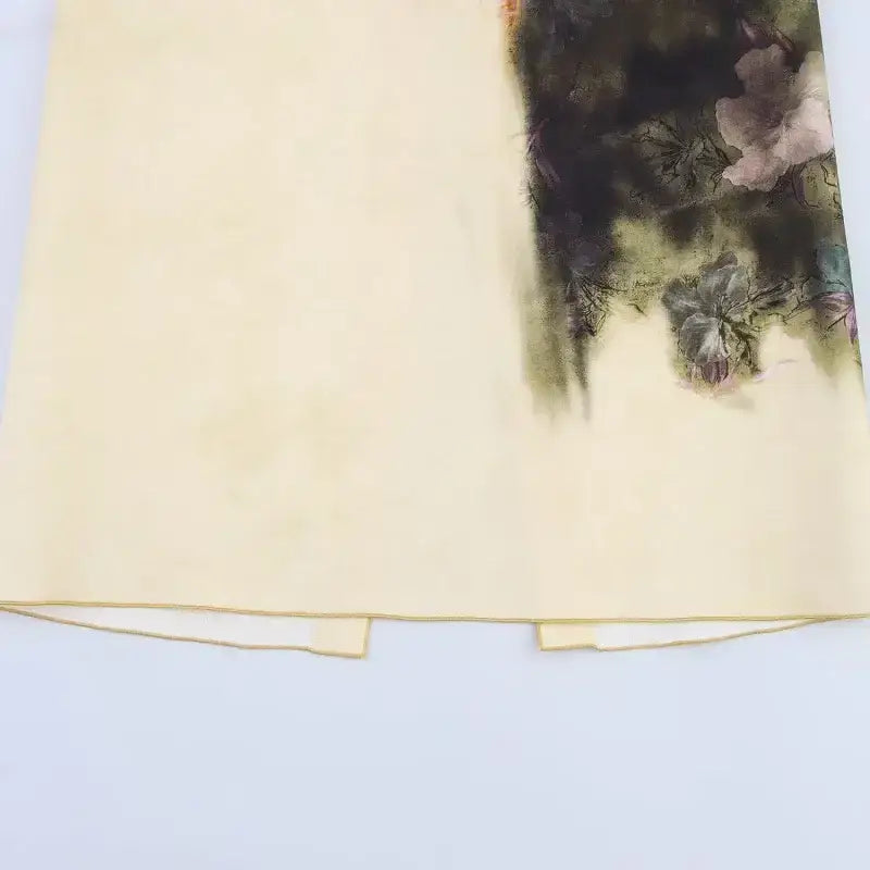 Beige skirt featuring artistic floral print design from The Lady's Haven Boutique fashion casual skirts with print