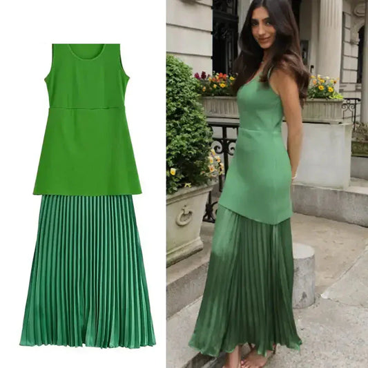 Sleeveless green maxi dress with pleated skirt featured by The Lady's Haven Boutique