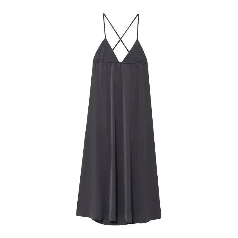 Black sleeveless backless midi dress with thin crisscross straps from The Lady's Haven Boutique