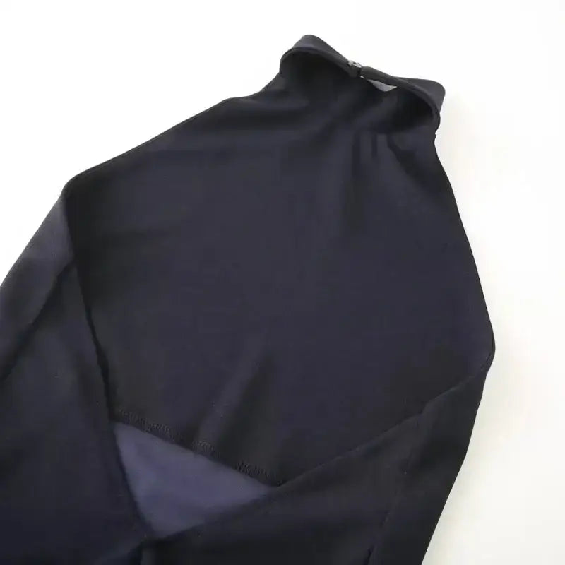 Navy blue formal evening dress maxi dress from The Lady's Haven Boutique laid flat on white background