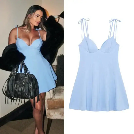 The Lady's Haven Boutique blue mini party dress with spaghetti straps and flared skirt worn and displayed