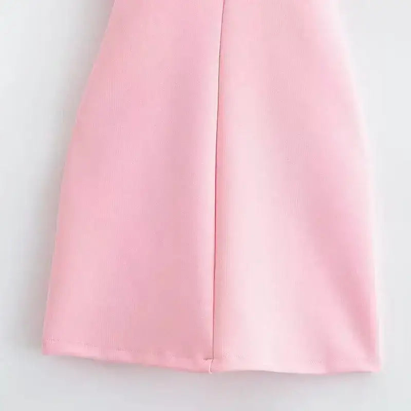 Close-up of soft pink fabric detail of mini slip dress from The Lady's Haven Boutique