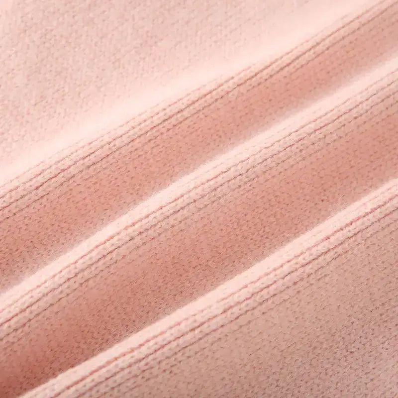 Close-up of soft pink fabric texture from fashion lightweight cardigan by The Lady's Haven Boutique