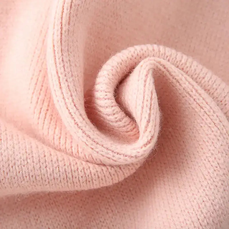 Close-up of soft pink fabric texture for a fashion lightweight cardigan from The Lady's Haven Boutique