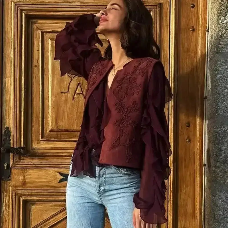 The Lady's Haven Boutique spring summer cropped vest in burgundy with floral embroidery and sheer ruffled sleeves