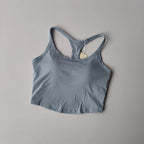 Light blue womens push up sports bra with a racerback design for active support and comfort