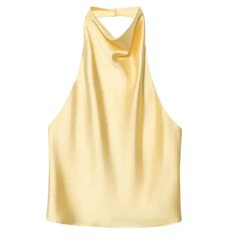Yellow satin halter crop top with a cowl neck design from The Lady's Haven Boutique
