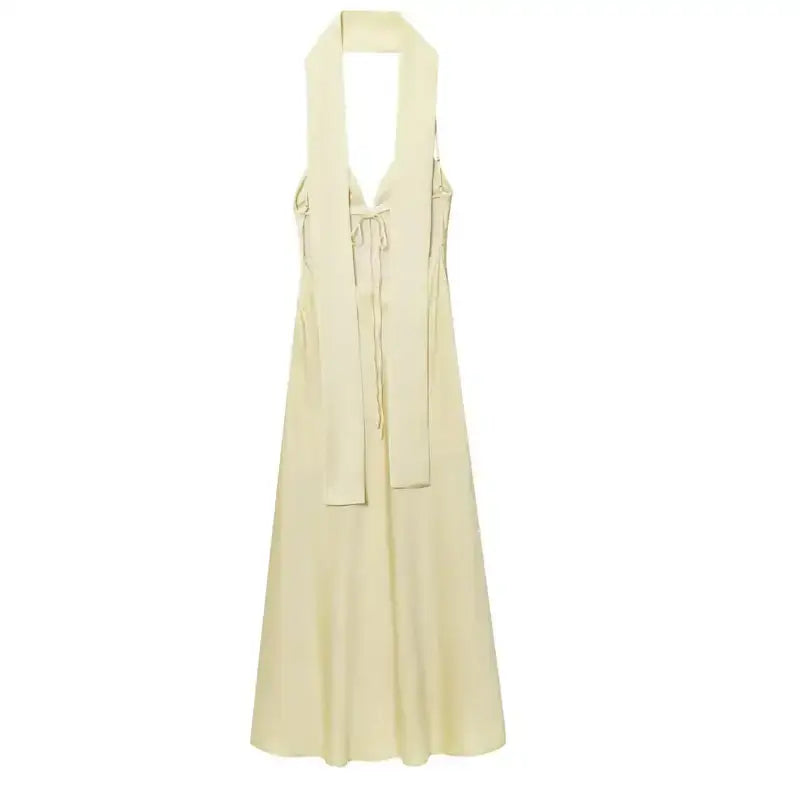 Elegant cream sleeveless satin formal dress with halter neck design from The Lady's Haven Boutique