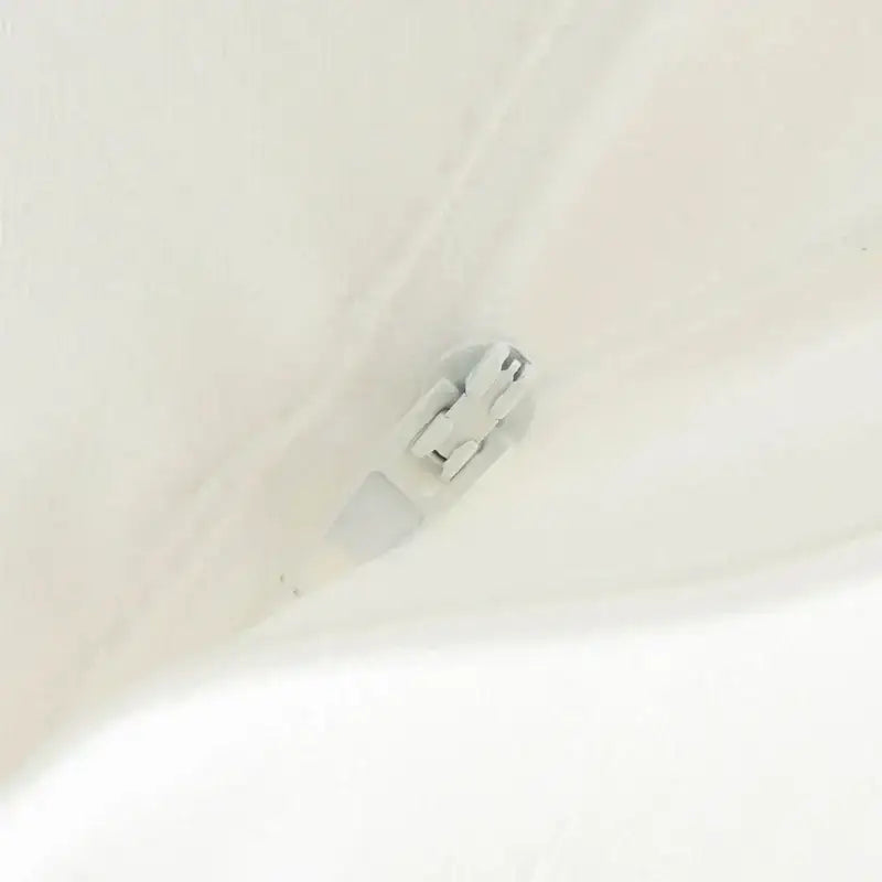 Close up of white zipper detail on summer office vest and shorts outfit from The Lady's Haven Boutique