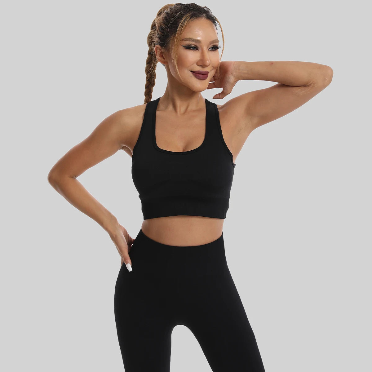 Stylish womens yoga set tracksuit in black, perfect for comfortable workouts and yoga sessions.