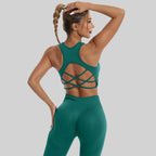 Womens yoga set tracksuit in green featuring a stylish crisscross back design for comfort and style
