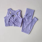 Light purple womens yoga set tracksuit featuring a stylish open-back sports bra and matching leggings
