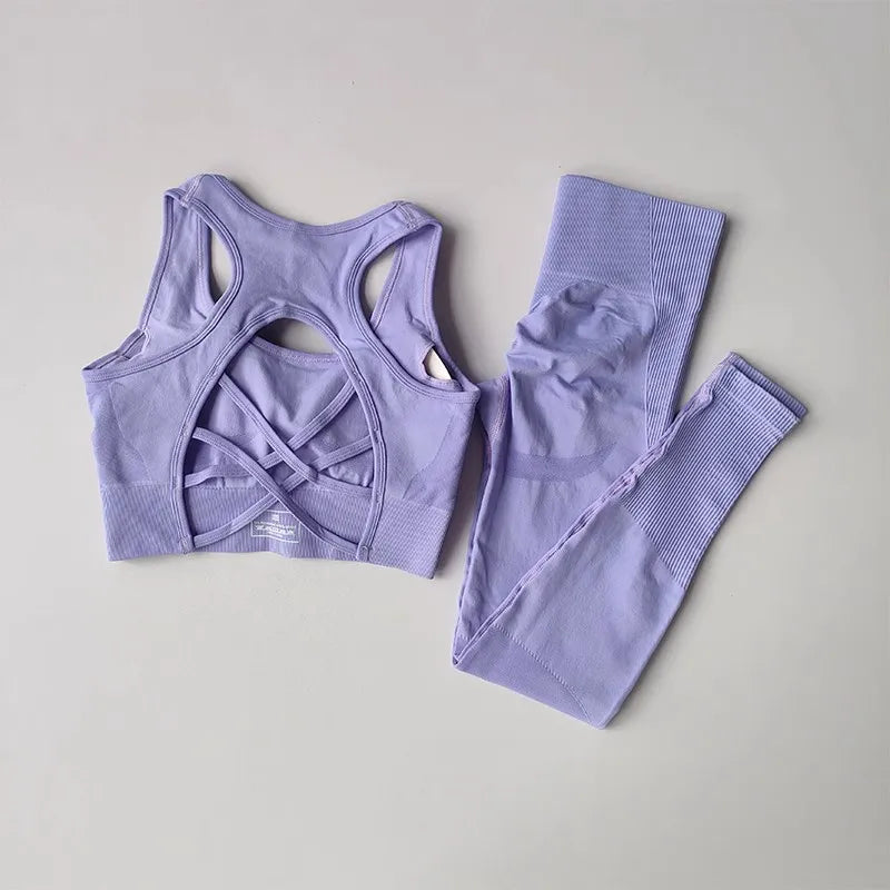 Light purple womens yoga set tracksuit featuring a stylish open-back sports bra and matching leggings