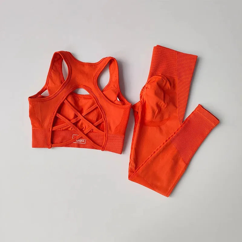 Bright orange womens yoga set tracksuit featuring a stylish sports bra and fitted leggings