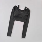 Black workout t-shirt with pads featuring long sleeves and a cropped design