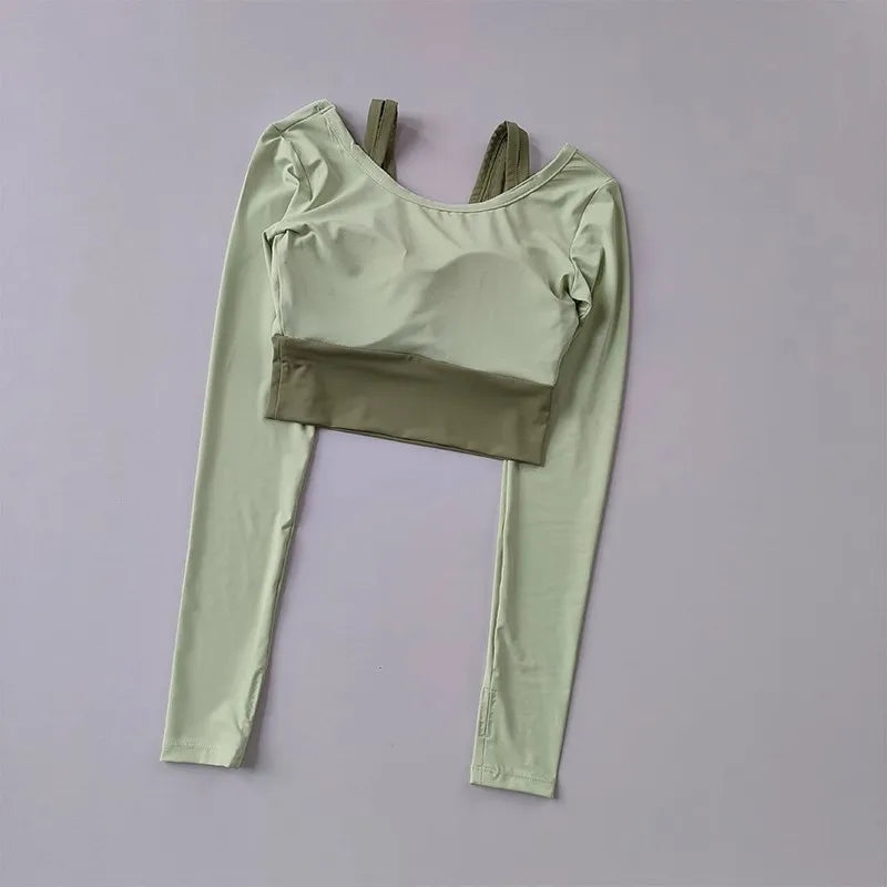 Light green workout t-shirt with pads featuring long sleeves and a cropped design