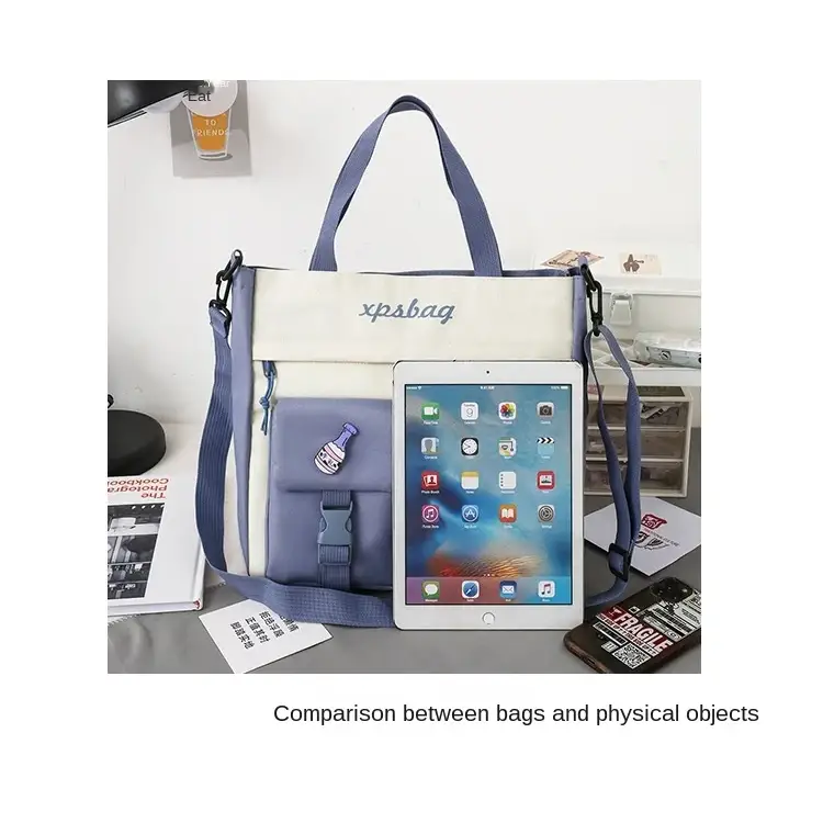 Large capacity ladies handbag in blue and white featuring an adjustable strap and stylish design