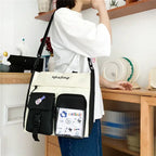 Stylish large capacity ladies handbag in cream with multiple pockets and adjustable strap