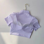 Light purple cropped yoga clothes for women with mesh detailing for comfort and style