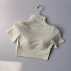 White cropped yoga top with a high collar, perfect for yoga clothes for women