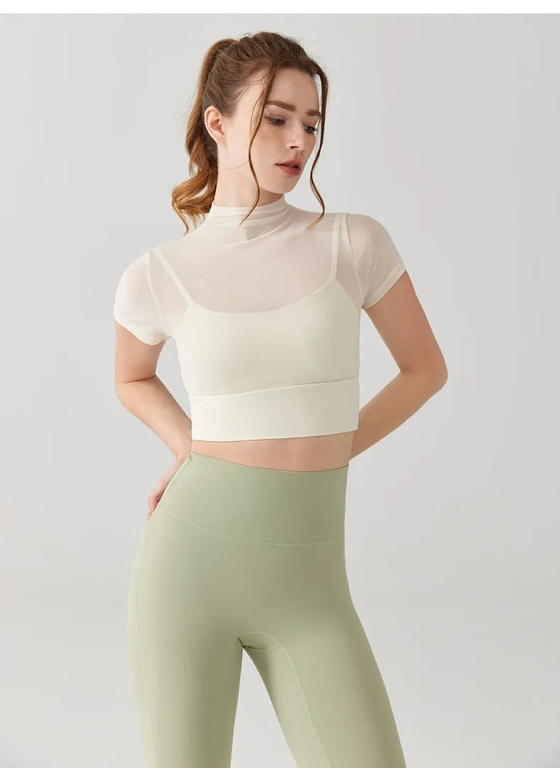Stylish yoga clothes for women featuring a fitted crop top and high-waisted leggings in soft pastel colors