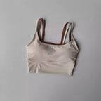 Light beige yoga crop top for workout with adjustable straps for maximum comfort and flexibility