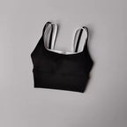 Black yoga crop top for workout with stylish design and comfortable fit for exercise enthusiasts