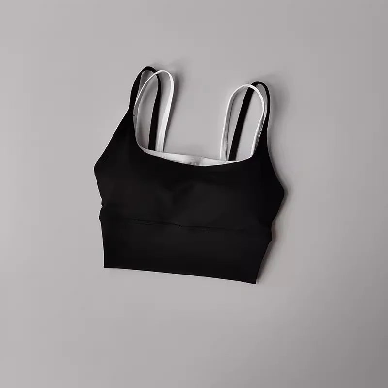 Black yoga crop top for workout with stylish design and comfortable fit for exercise enthusiasts