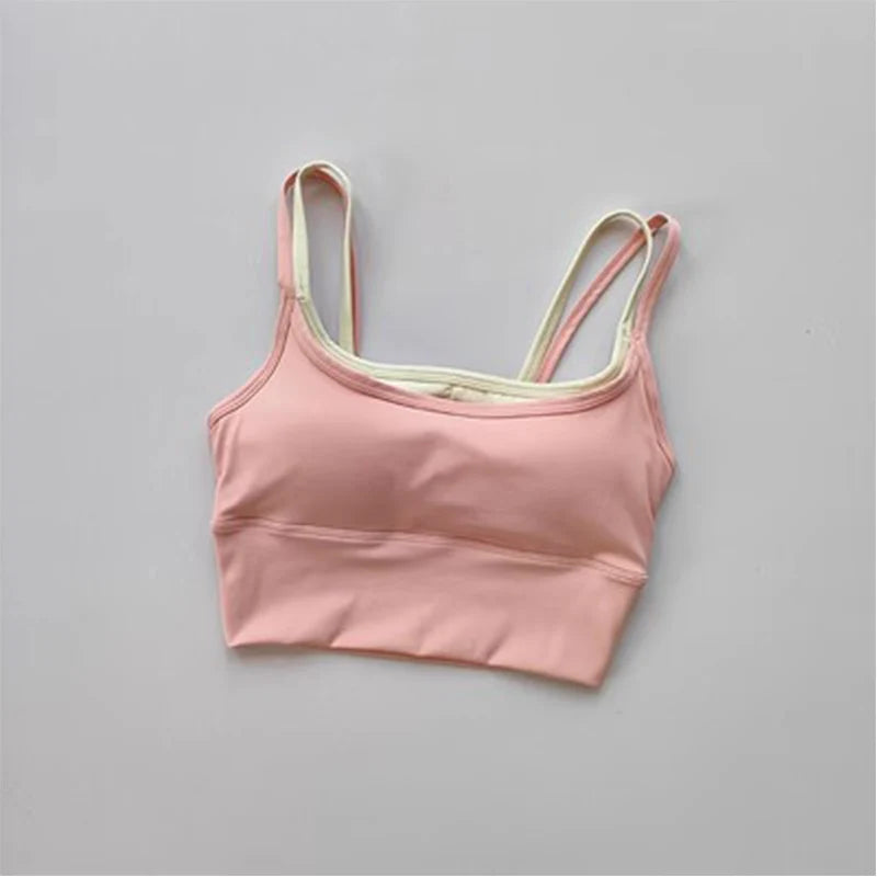 Light pink yoga crop top for workout with comfortable straps and supportive fit